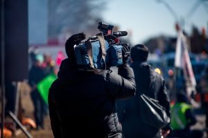 Camera Man with backpack